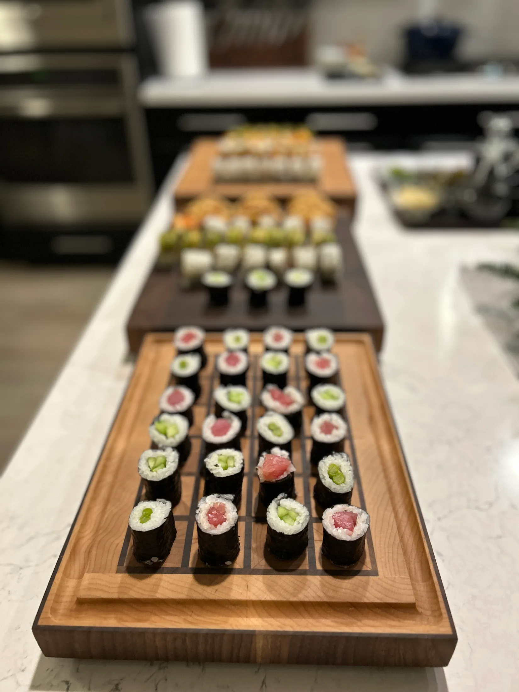 Sushi arranged on a handmade charcuterie board