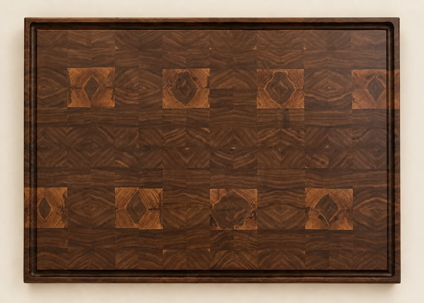 Walnut cutting board with repeated geometric end-grain motifs