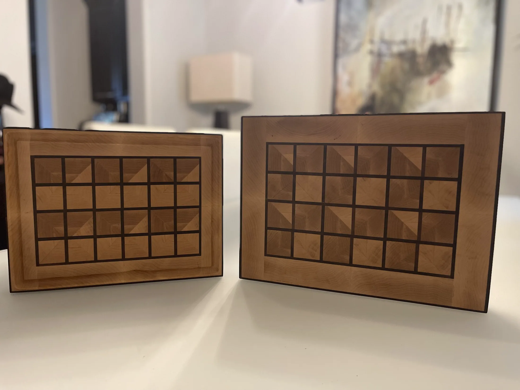 Two maple serving boards with dark geometric inlay